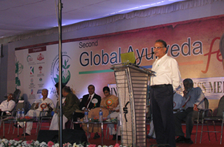 Dr. Natarajan delivering a speech